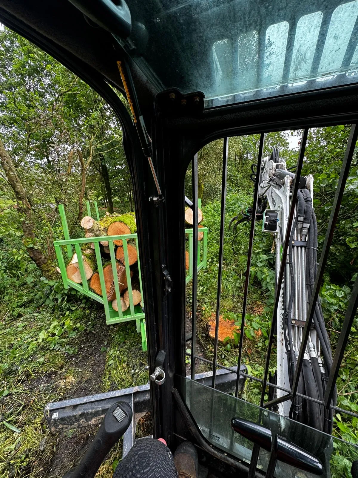 Excavator fitted with tree shears clearing the Barnoldswick development site