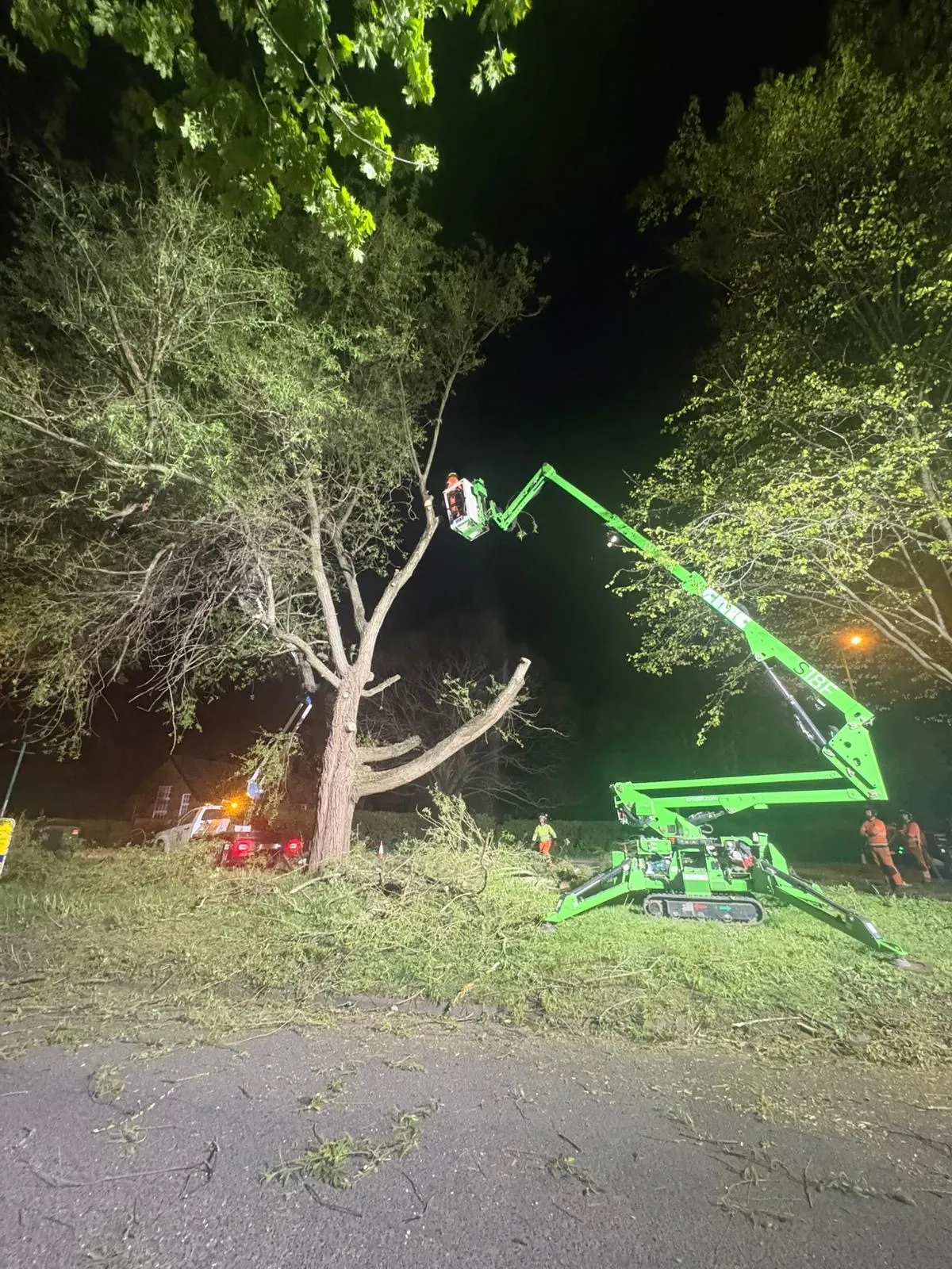 NorthernArb crew working from a cherry picker on an emergency call-out at night