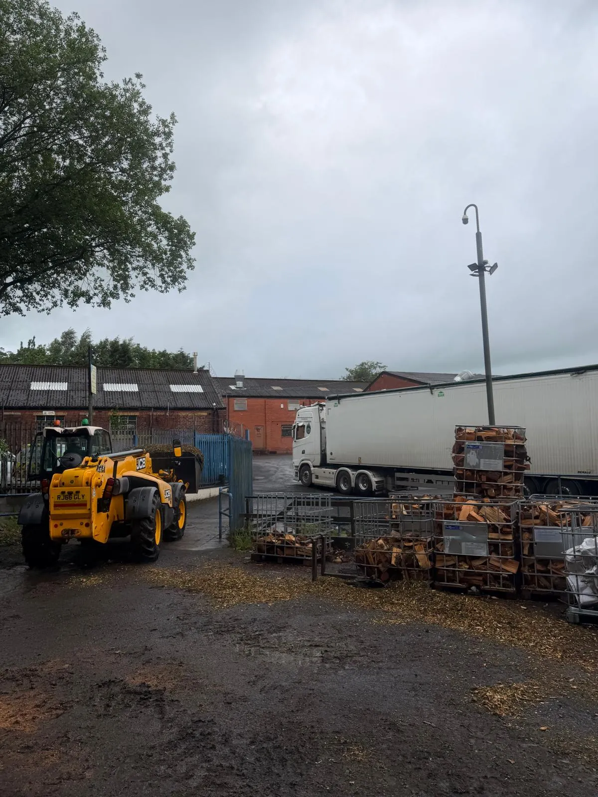 NorthernArb's yard, with recycled logs and machinery ready for the next job