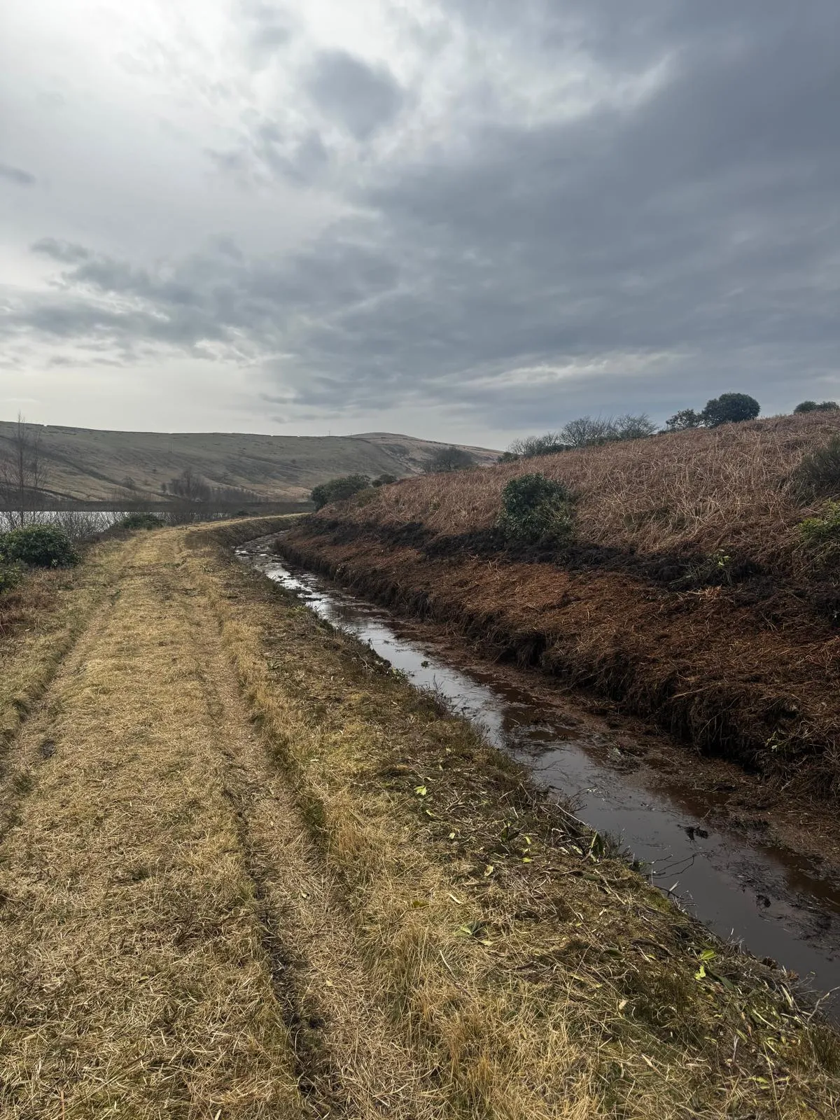 Cleared waterway and access track at Saddleworth reservoir